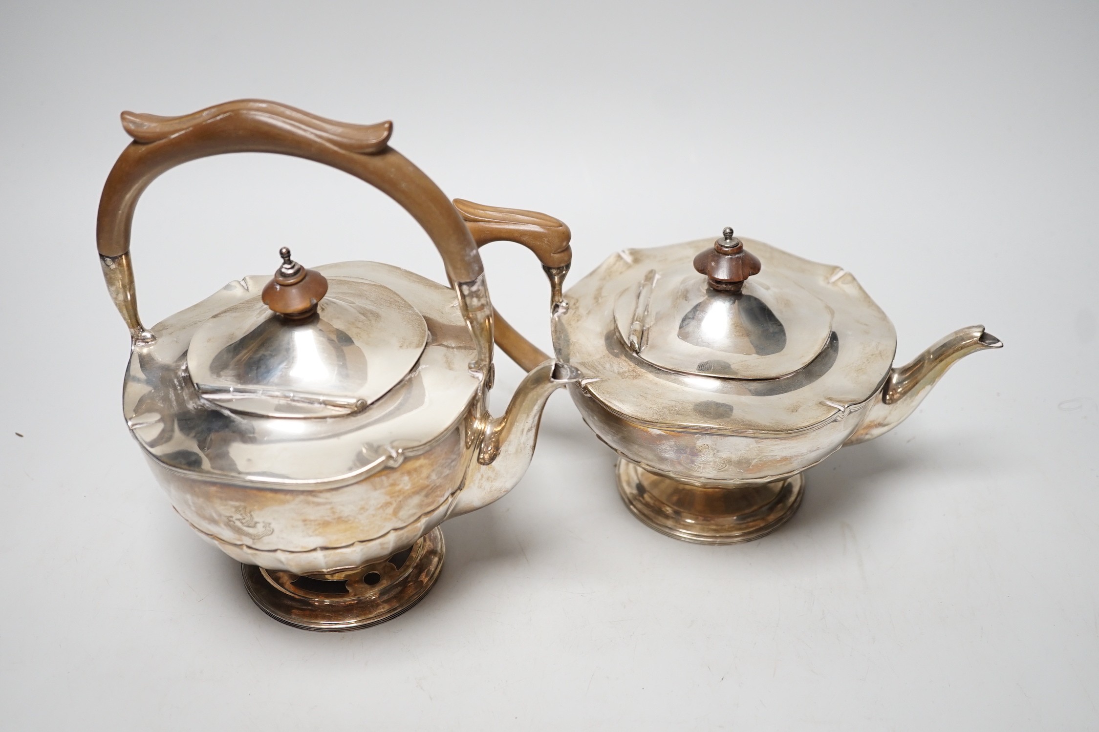 A George V silver tea kettle and teapot by Walker & Hall, Birmingham, 1919 & 1922, kettle height 20.5cm, 30.6oz.